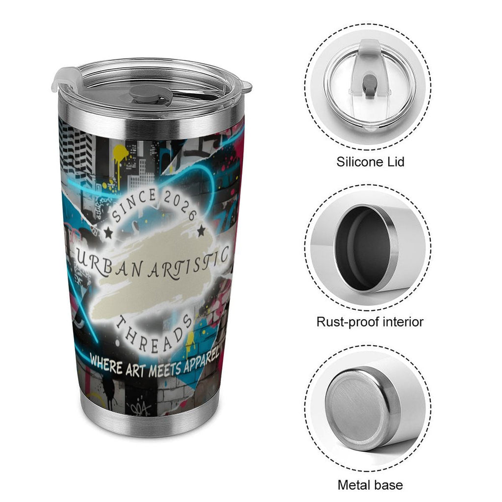 Urban Artistic Threads travel mug with graffiti city art, silicone lid, rust-proof interior, metal base.