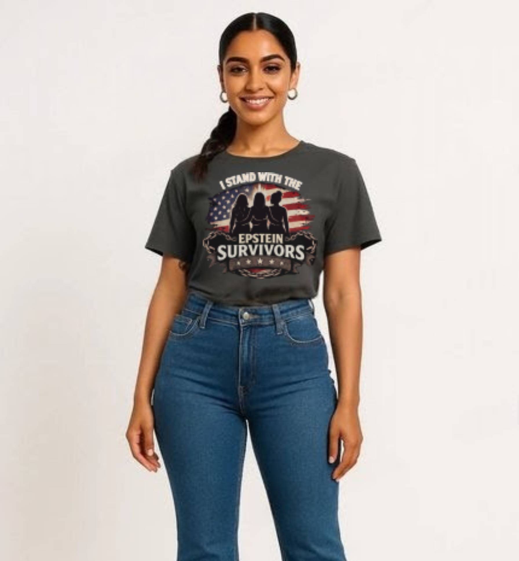 Woman wearing a dark gray shirt with I Stand With The Epstein Survivors graphic and an American flag motif.