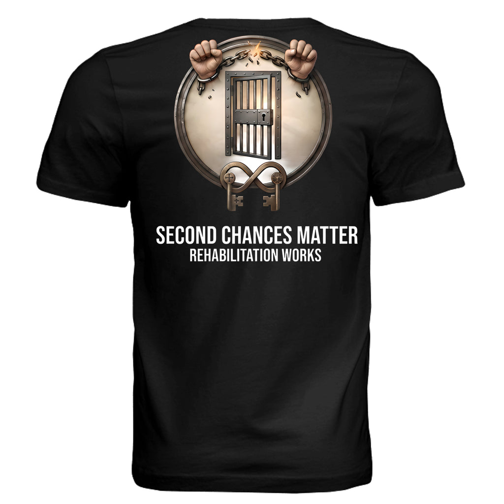 Rehabilitation Works graphic tee with hands breaking chains over prison bars; Second Chances Matter unisex shirt