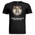 Black unisex tee with a circular emblem showing hands breaking chains from a jail door, Second Chances Matter.