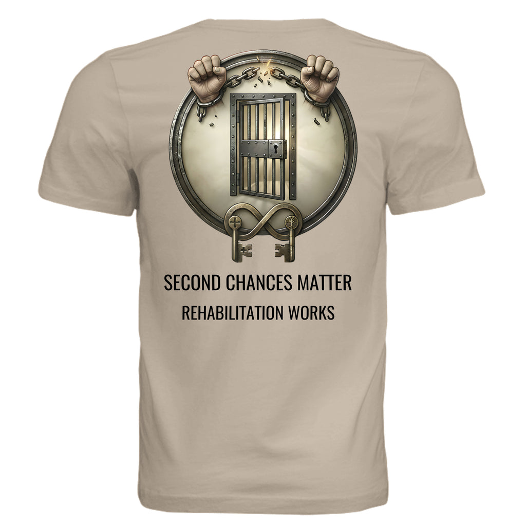 Rehabilitation Works graphic tee: hands breaking chains from a circular jail door; Second Chances Matter.