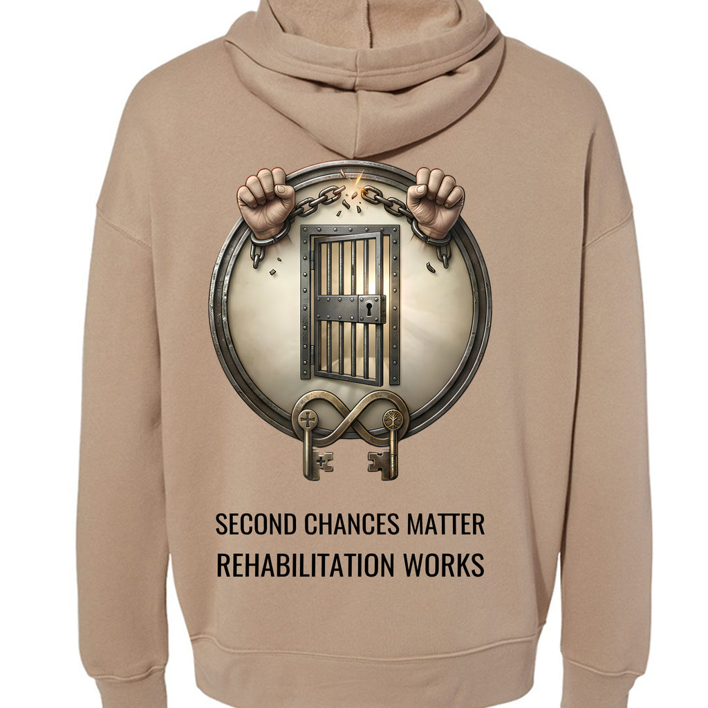 Tan hoodie with a large circular prison badge reading Second Chances Matter and Rehabilitation Works.