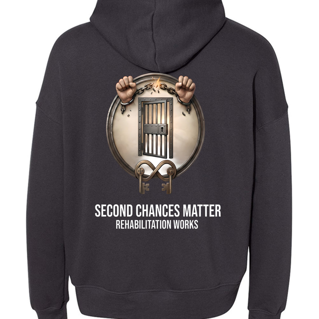 Second Chances Matter Rehabilitation Hoodie: unisex charcoal fleece with circular jail door emblem.