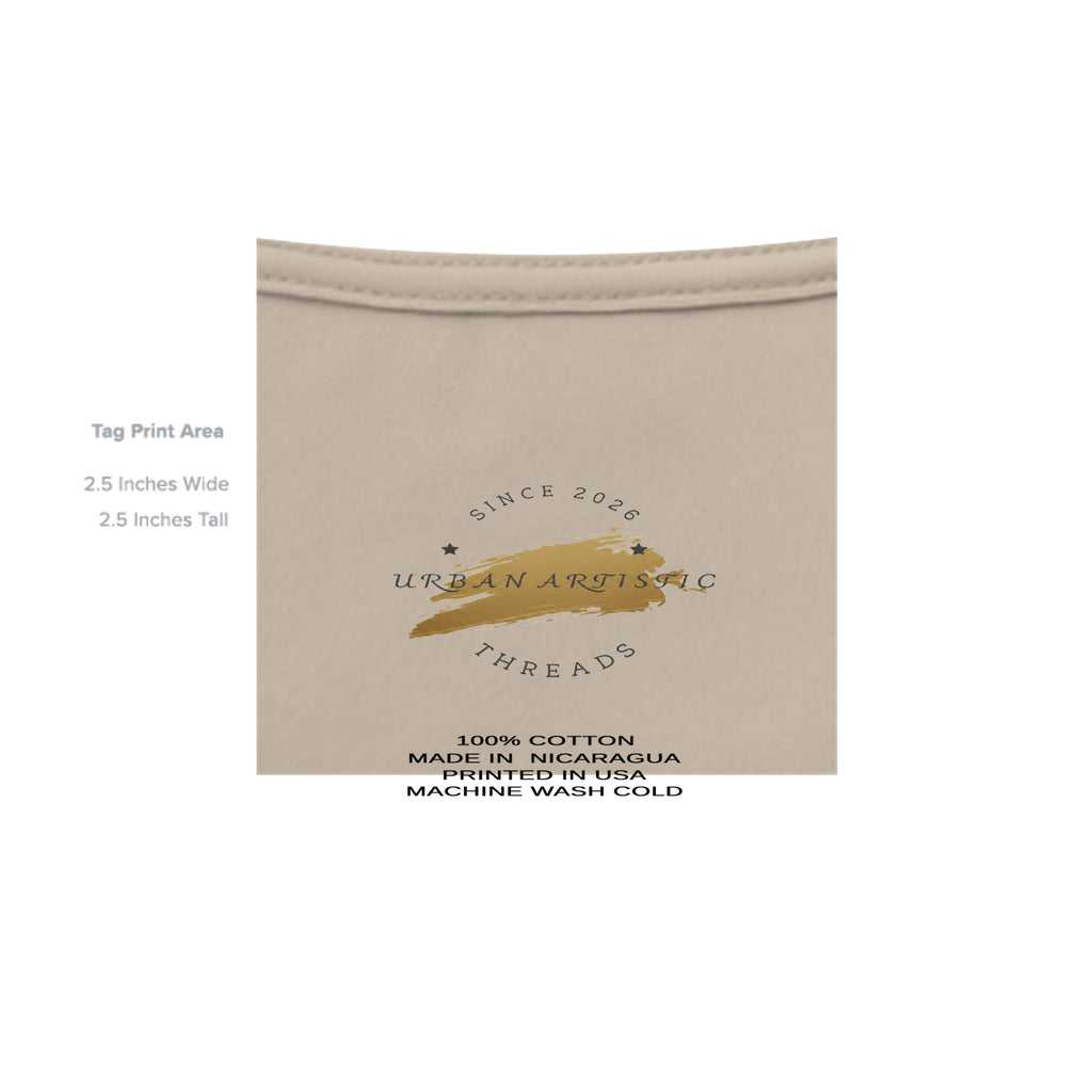 Urban Artistic Signature Logo Tee packaging: beige tag with paint-stroke emblem, 100% cotton, made in Nicaragua.