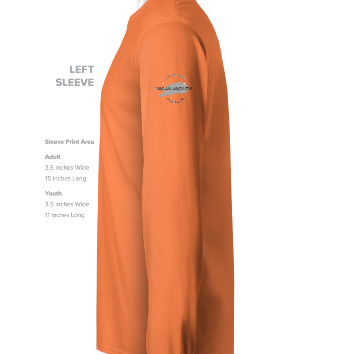 Orange long sleeve tee left sleeve displaying small Urban Artistic Threads circular logo with print area dimensions listed.