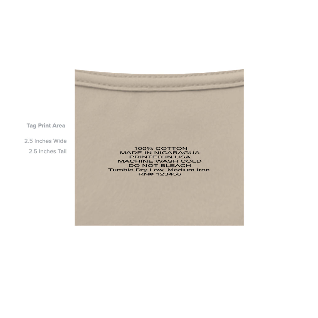Beige Urban Artistic Signature Tee fabric showing neck ribbing and printed care instructions for 100% cotton garment.