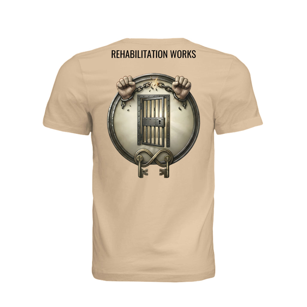 Beige shirt back with "Rehabilitation Works" graphic showing broken chains, prison bars, and keys symbolizing second chances.