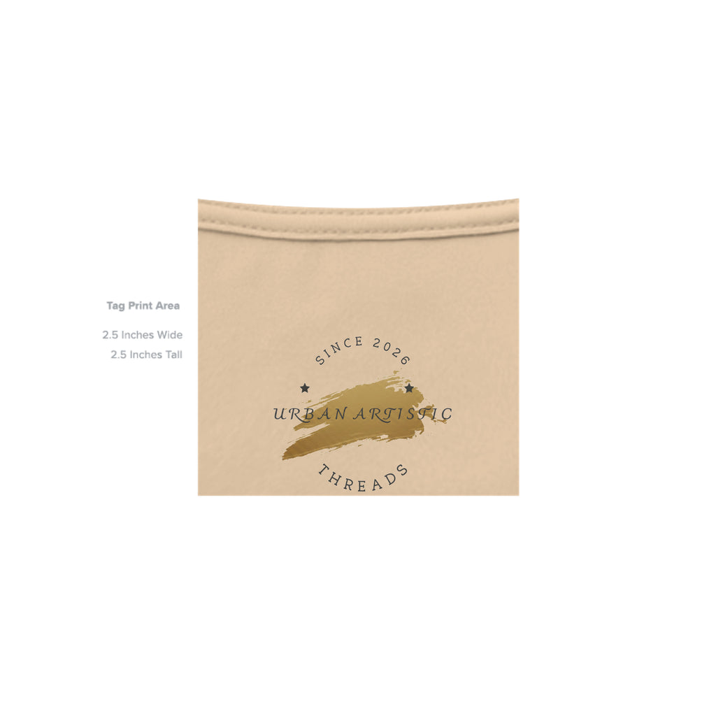 Beige shirt fabric with gold brushstroke logo reading Urban Artistic Threads Since 2026 for rehabilitation advocacy apparel.
